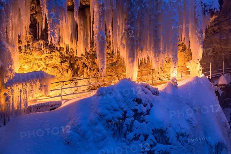 Breitachklamm gorge in winter by torchlight