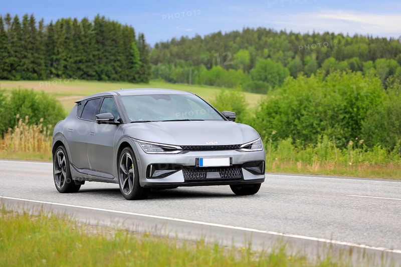 Silver Kia EV6 battery electric car at speed on highway