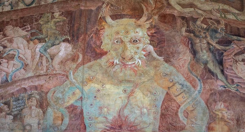Pisa, Italy, 29 June 2023: Fresco in the Cemetery with Satan and the medieval hell, gothic design, 1464, Europe