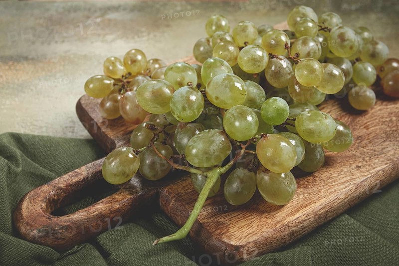 A branch of white grapes, wine grapes, Georgian grape variety Rkatsiteli, top view