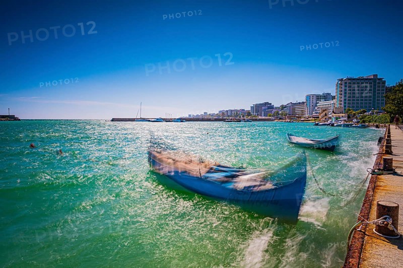 Summer coastal view with boats and hotel buildings in the sunny sky, Golden Sands, Varna, Bulgaria, Europe