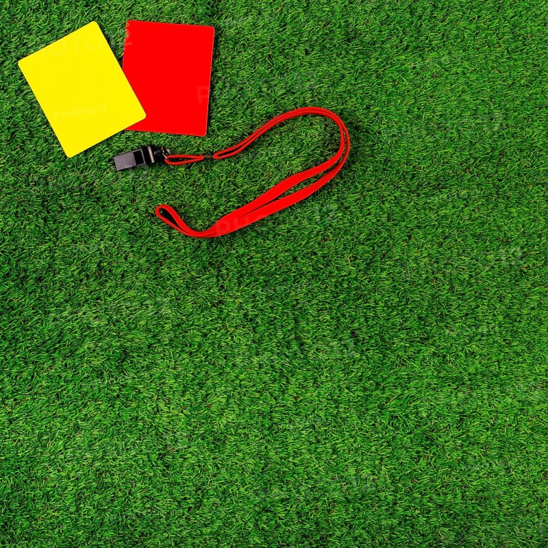 Football composition with red yellow cards
