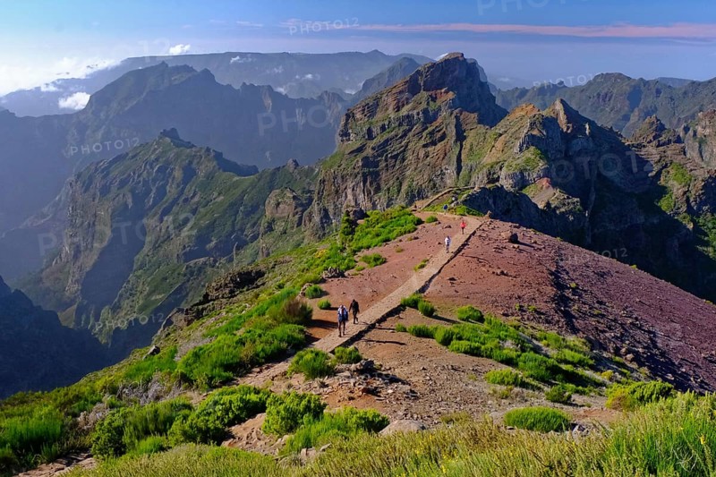 View from Pico do Arieiro (1818m) hiker, hiking trail, mountains, gorse, Madeira Island