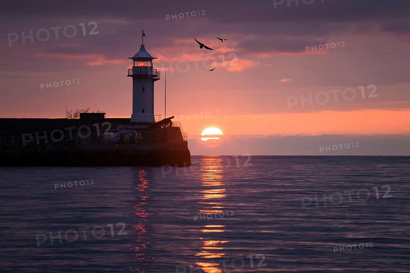 Lighthouse on sunrise. Yalta, Crimea, Ukraine, Europe