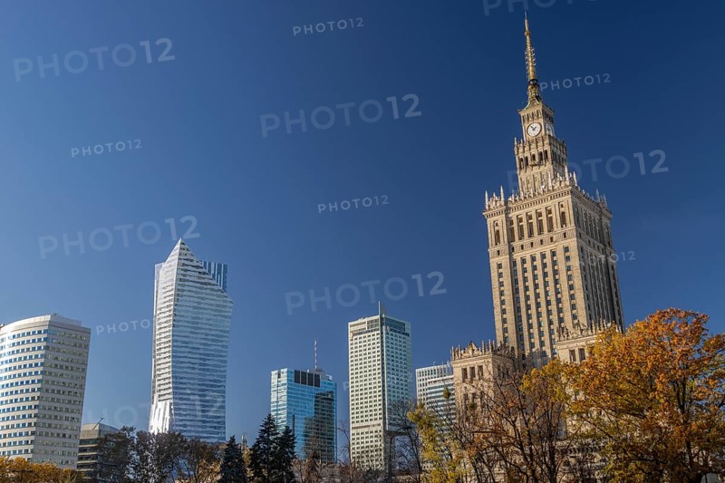 Warsaw skyline with the Skylight of Zlote Tarasy, Zlota 44, Rondo 1, the InterContinental Warsaw and the Warsaw Financial Center skyscrapers, as well as Palac Kultury i Nauki, the PKiN or the Palace of Culture and Science, photographed against the blue sky early in the afternoon on a sunny autumn day. Sródmiescie, the Warsaw Downtown, Warsaw, Masovian Voivodeship, Poland, Europe