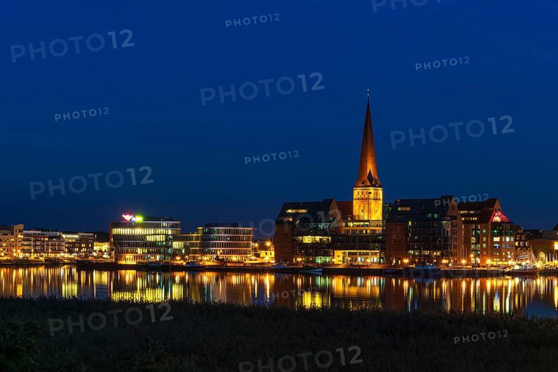 View across the Warnow to the Hanseatic city of Rostock in the evening