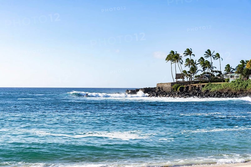 View of a paradisiacal beach in Oahu, Hawaii. Waimea Beach ia a popular snorkeling spot
