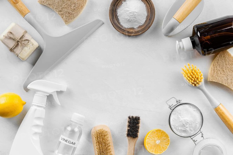 Flat lay eco cleaning products with lemon baking soda