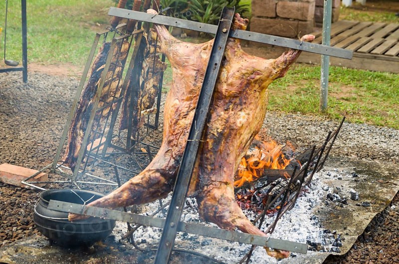 Meat and vegetable exhibition on a barbecue known as Parrilla. Typical barbecue from the south of Latin America