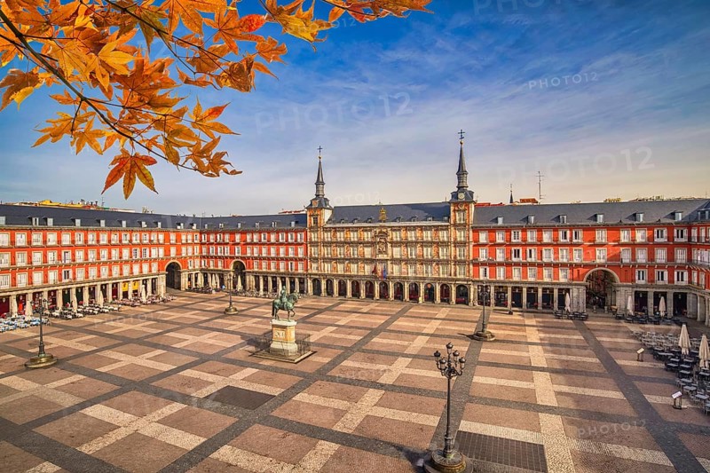 Madrid Spain, city skyline at Plaza Mayor with autumn leaf foliage