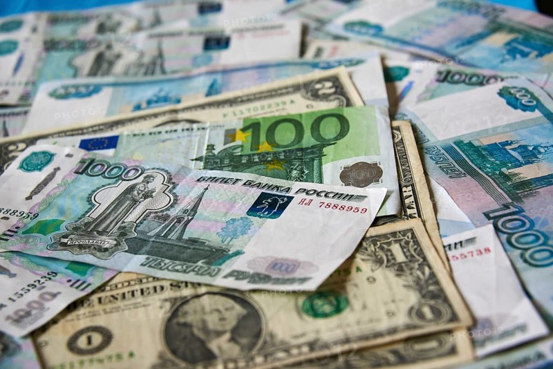 Background of paper bills dollars, euros and rubles