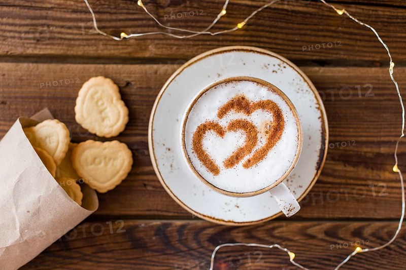 Top view coffee cup heart shaped cookies