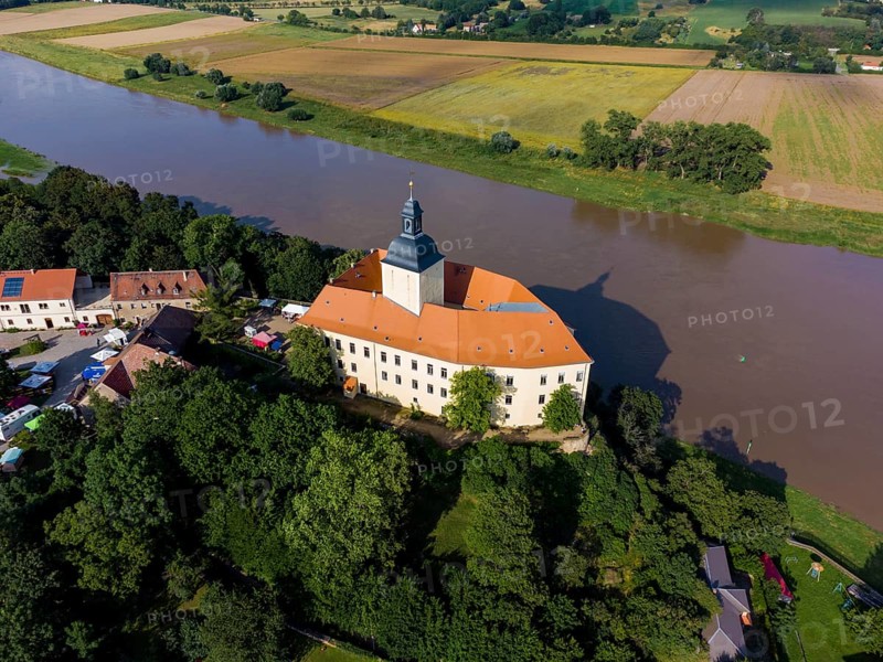 Hirschstein Castle is a castle in the municipality of Hirschstein in the district of Meißen, which grew out of a medieval castle It rises imposingly on a 25-metre-high cliff on the left bank of the Elbe opposite Neuseußlitz