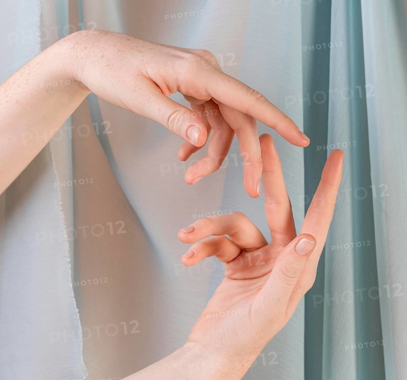 Young woman teaching sign language 2