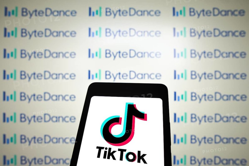March 14, 2024, Brazil. In this photo illustration, the TikTok logo is displayed on a smartphone screen with the logo ByteDance in the background