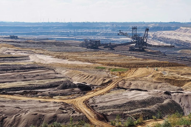 View over the Garzweiler open-cast lignite mine with large excavator, Rhenish lignite mining area, Germany, Europe
