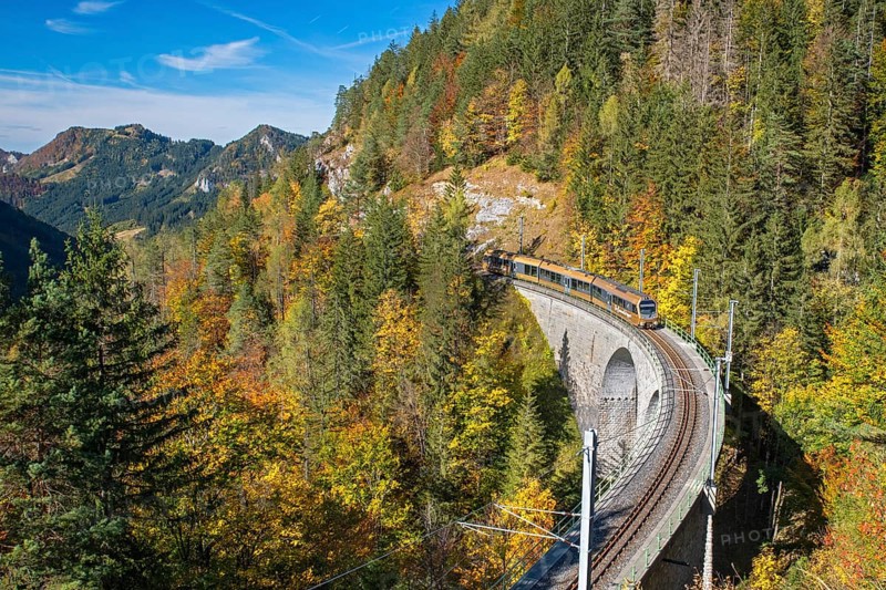 The Himmelstreppe of the Mariazell Railway travels through the autumnal landscape of the Ötscherland. Saugraben Viaduct near Annerberg, Lower Austria, Austria, Europe