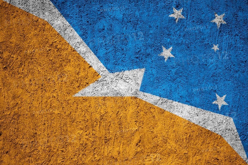 Bandera de la Provincia de Tierra del Fuego flag painted on the cracked grunge concrete wall