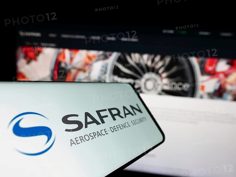Stuttgart, Germany, 12-02-2022: Cellphone with logo of French aerospace company Safran S.A. on screen in front of business website. Focus on center-left of phone display, Europe