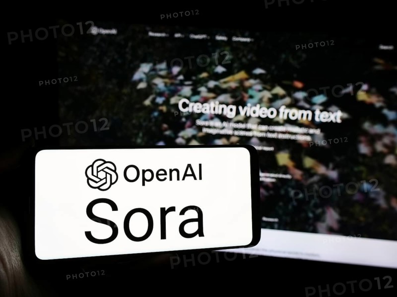 Stuttgart, Germany, 03-06-2024: Person holding smartphone with logo of text-to-video model software Sora (OpenAI) in front of website. Focus on phone display, Europe