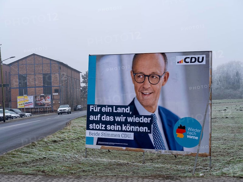 Election poster of the CDU for the Bundestag election on 23 February 2025 with a portrait of the chancellor candidate Friedrich Merz and the text: For a country we can be proud of again, Braunschweig, Lower Saxony, Germany, Europe