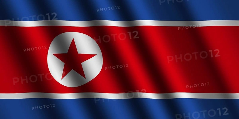 The North Korea flag flying in the wind