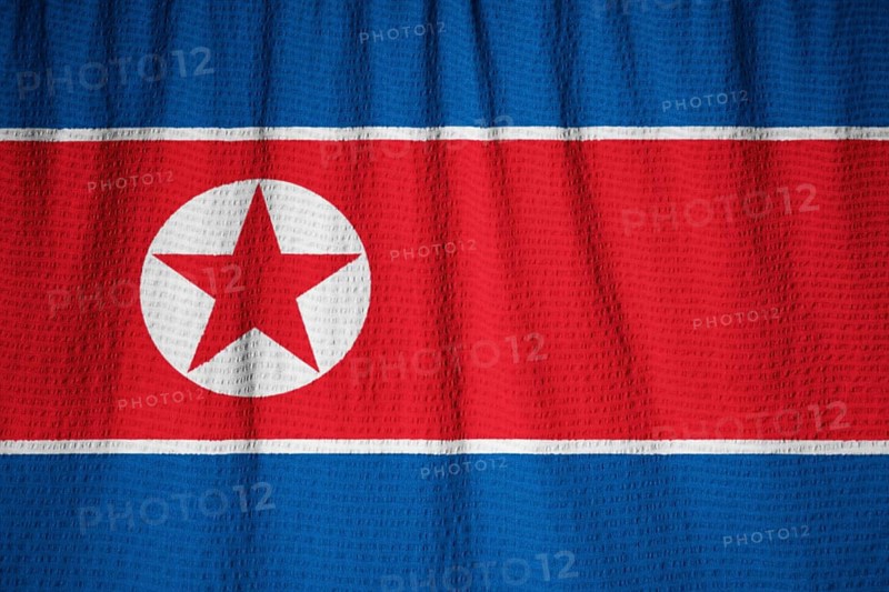 Closeup of Ruffled North Korea Flag, North Korea Flag Blowing in Wind
