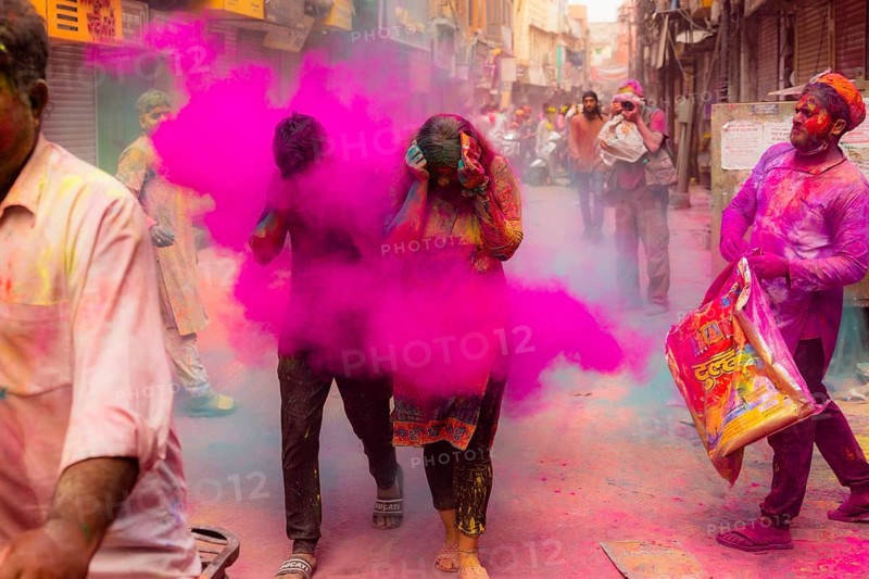 Holi Festival of Colors in the streets of Mathura, India, Asia