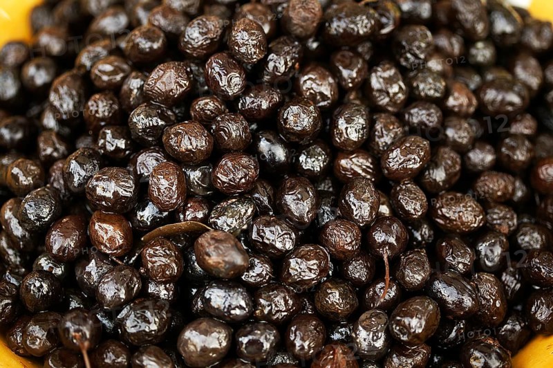 BLACK OLIVES olea europa on a market stall