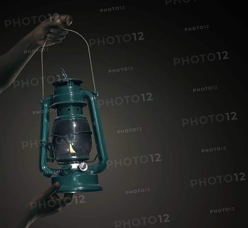 Man with a paraffin lamp