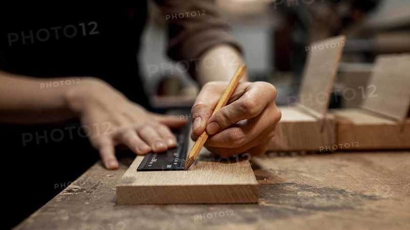 Female carpenter working studio with pencil. Resolution and high quality beautiful photo