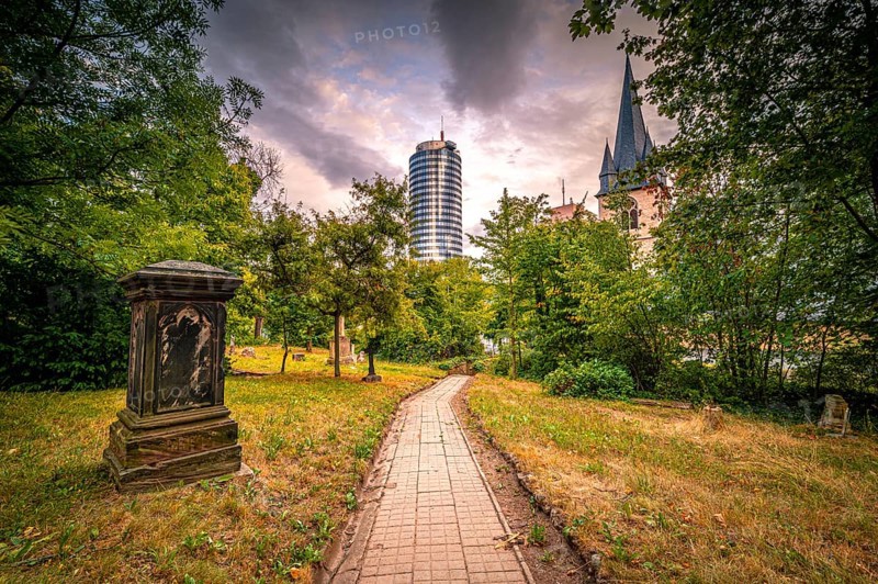 View of the Jentower on the left and the Catholic Church of St. John Baptist on the right from the Johannisfriedhof, Jena, Thuringia, Germany, Europe