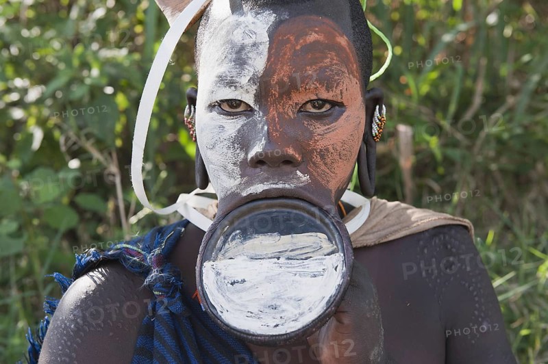 Surma woman with round lip plate, lip plate, Kibish, Omo Valley, Ethiopia, Africa
