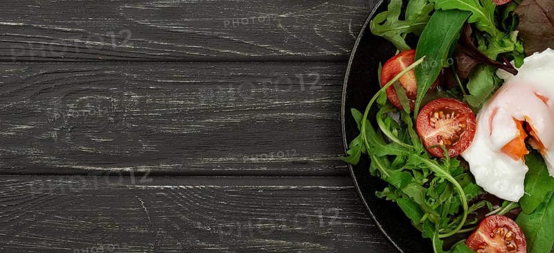 Top view salad with fried egg copy space