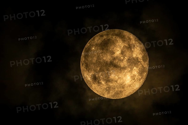 Super moon one day after full moon, moon behind clouds, Braunschweig, Lower Saxony, Germany, Europe