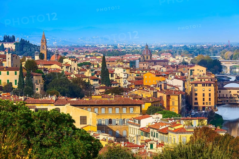 Florence, Italy city panorama with Oltrarno houses Santo Spirito tower and Ponte Vecchio bridge across the river Arno