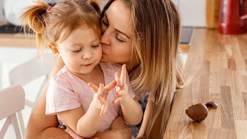 Mother spending time together with her daughter home