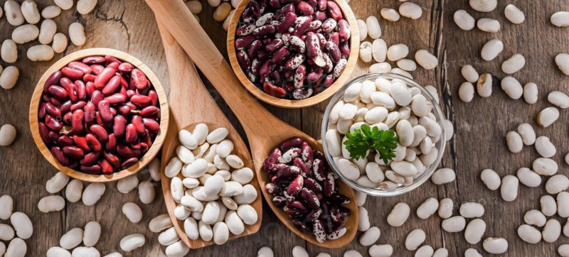 Composition with dried beans on the table