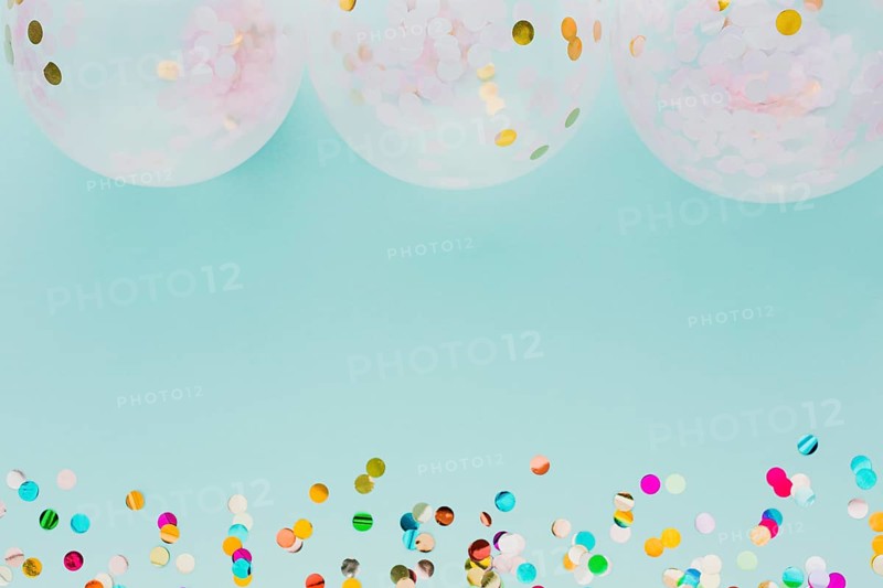 Flat lay party decoration with balloons blue background. Beautiful photo