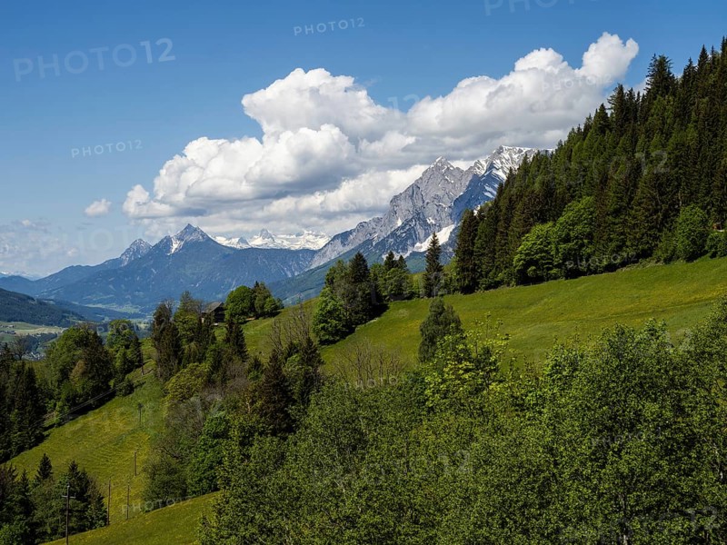 Wooded landscape, view of the Enns Valley, with the Grimming and Dachstein glaciers in the background, near Aigen im Ennstal, Styria, Austria, Europe