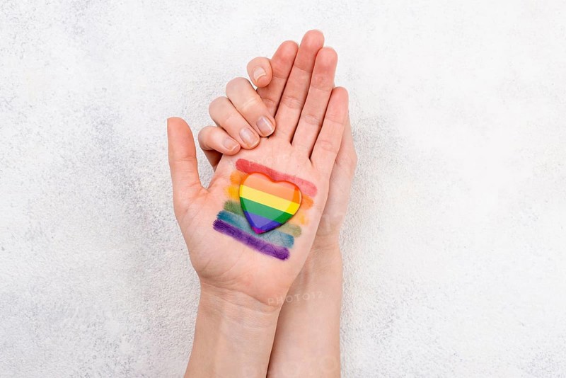 Rainbow flag painted hand