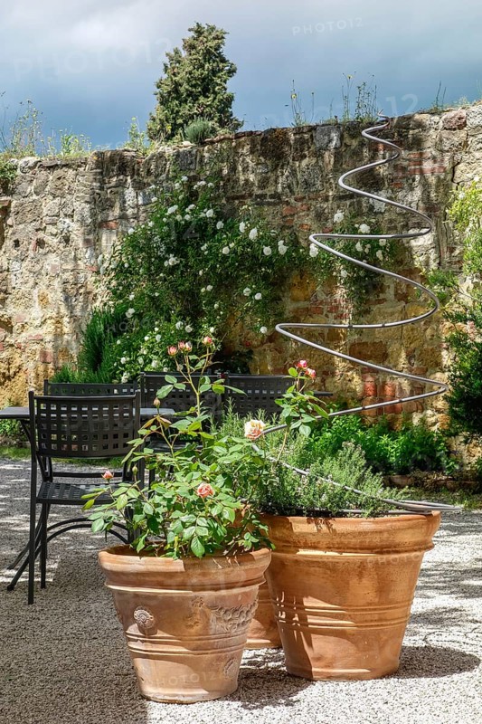 PIENZA, TUSCANY, ITALY - MAY 19 : Potted plants in a restaurant in Pienza on May 19, 2013