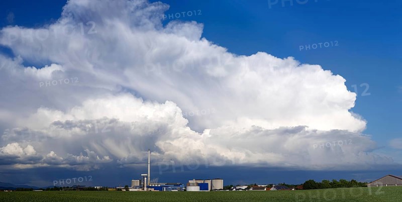 Thundercloud over the Südzucker factory, Plattling, Lower Bavaria, Germany, Europe