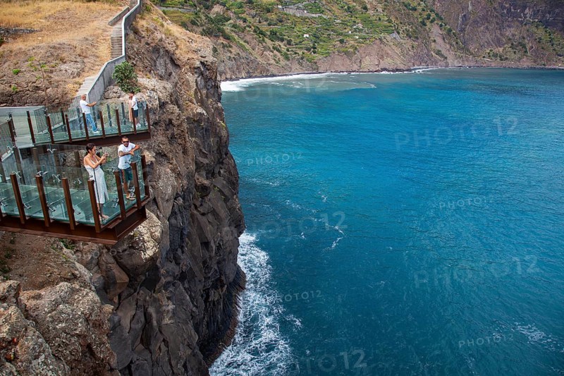 Tourists look at view from Glass bottomed skywalk, Cabo Girao, Funchal, Madeira, Portugal, Europe