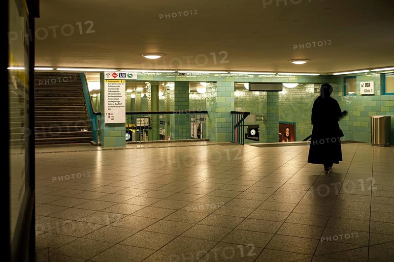 Germany, Berlin, 17. 09. 2020, Alexanderplatz underground station, lone woman, veiled in black, Europe