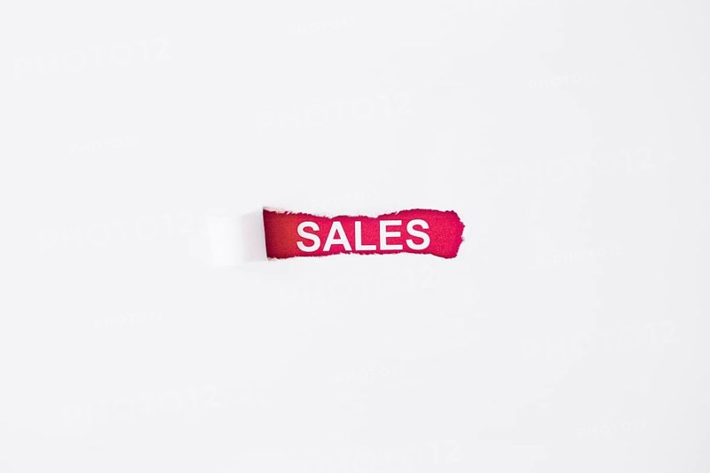 Sales inscription torn paper