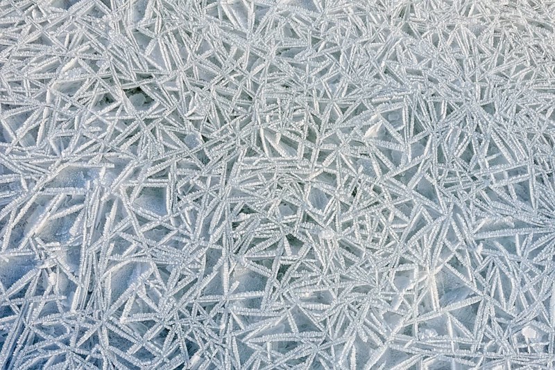 Frozen ice texture on the Dnieper river in Kiev, Ukraine, during winter, Europe
