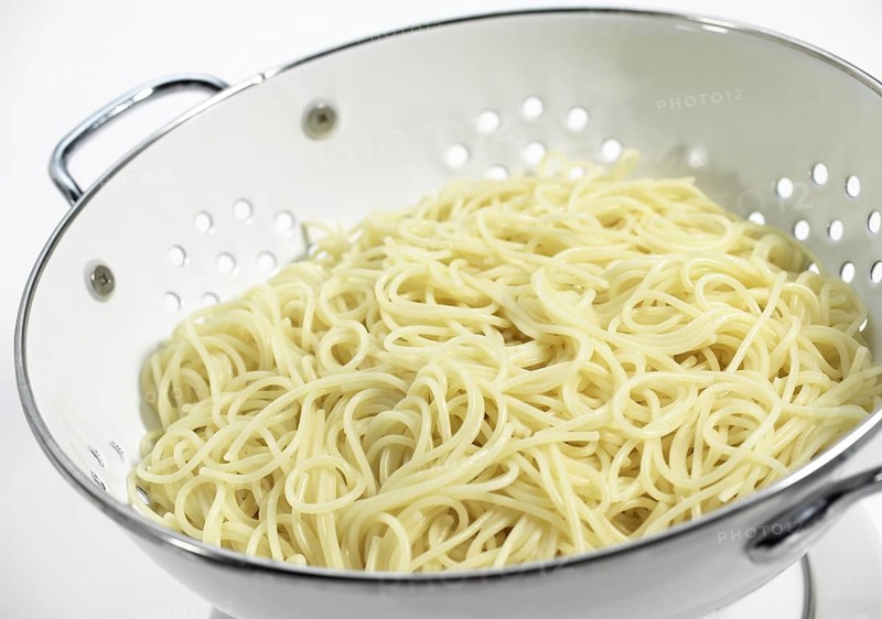 Spaghetti noodles in the skimmer