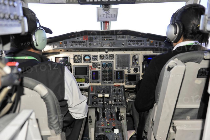 Detailed shot of the cockpit focussing on instruments and control systems, impressions of the great panoramic flight along the Himalayan giants, the roof of the world Kathmandu Nepal
