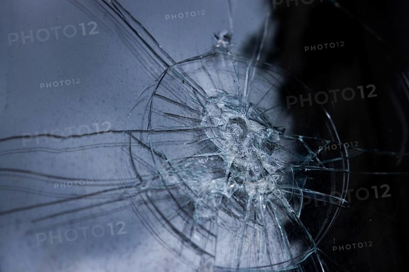 Pattern of smashed window pane, glass is splintered, window pane broken, close-up, Portbail, Cotentin, Manche, Normandy, France, Europe